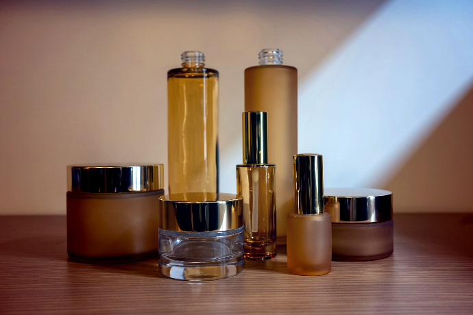 a group of bottles sitting on top of a wooden table